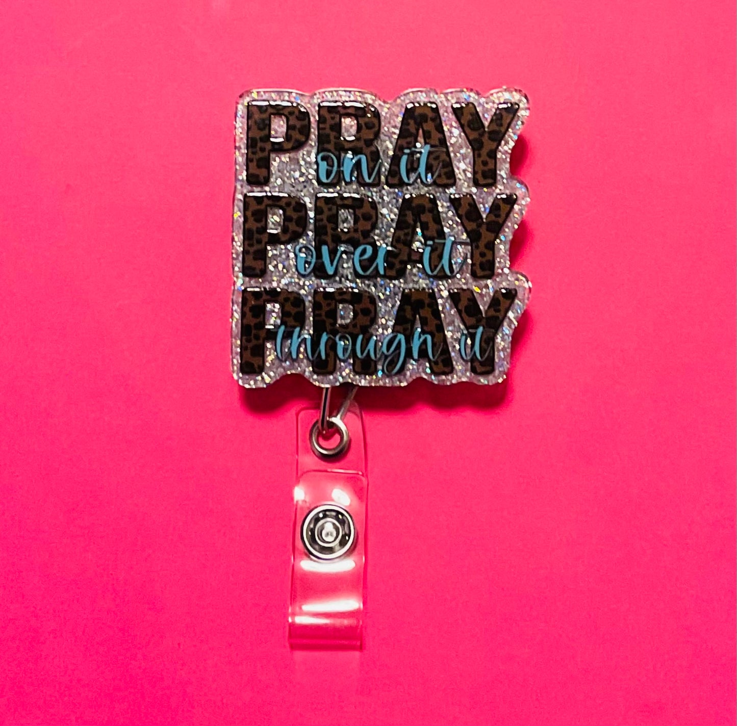 Pray on it, over it, through it Badge Reel